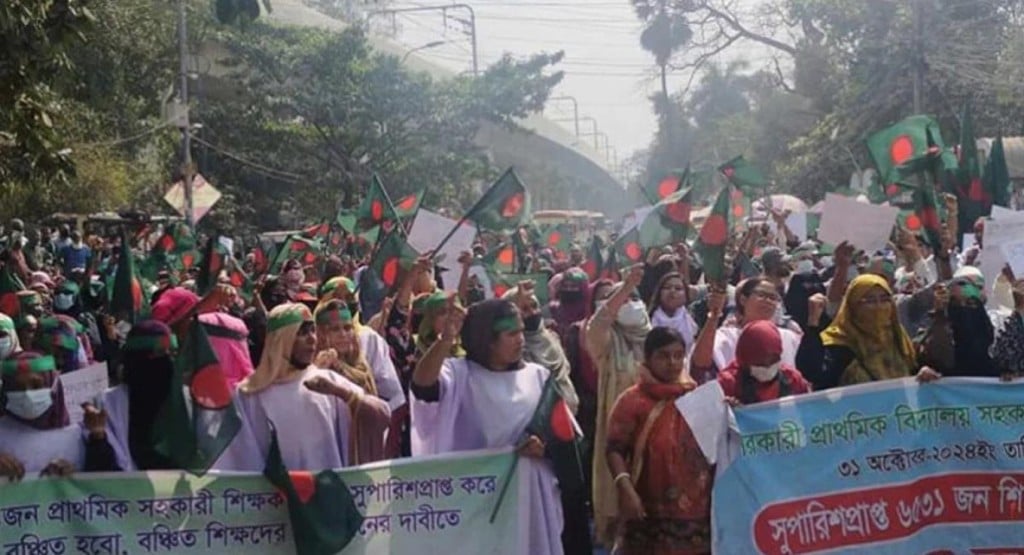 কাফনের কাপড় পরে সুপারিশপ্রাপ্ত প্রাথমিক শিক্ষকদের শাহবাগে অবস্থান 3 pri 1739438192 কাফনের কাপড় পরে সুপারিশপ্রাপ্ত প্রাথমিক শিক্ষকদের শাহবাগে অবস্থান