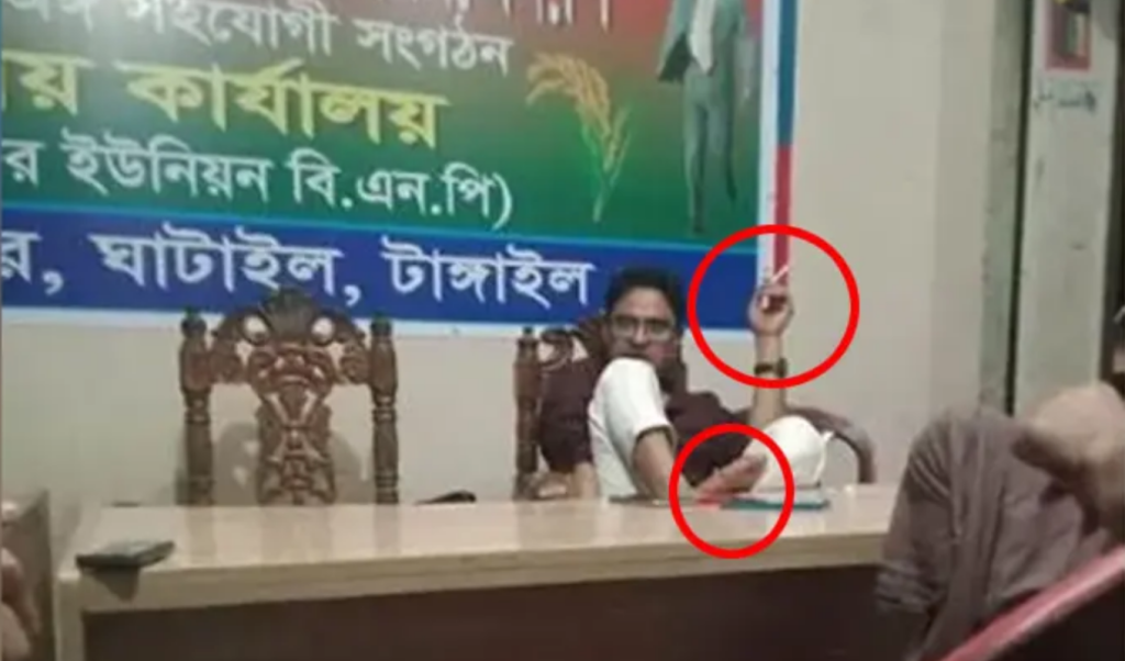 টেবিলে পা হাতে সিগারেট বিএনপি অফিসে আড্ডা দেন আ. লীগ নেতা 1748272741 টেবিলে পা, হাতে সিগারেট; বিএনপি অফিসে আড্ডা দেন আ. লীগ নেতা