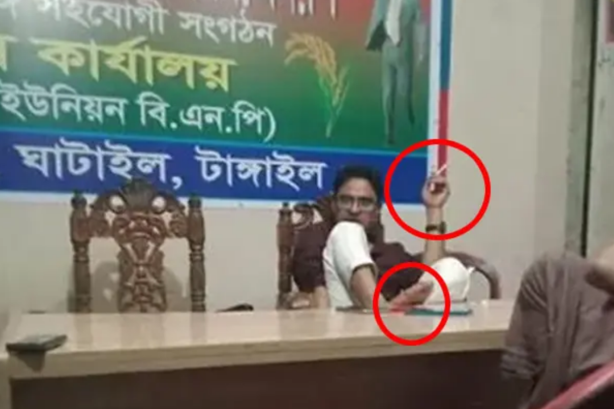টেবিলে পা, হাতে সিগারেট; বিএনপি অফিসে আড্ডা দেন আ. লীগ নেতা