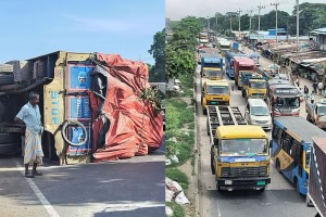 সীতাকুণ্ডে ১১ ঘণ্টা ধরে মহাসড়কে উল্টে আছে ট্রাক, দীর্ঘ যানজট