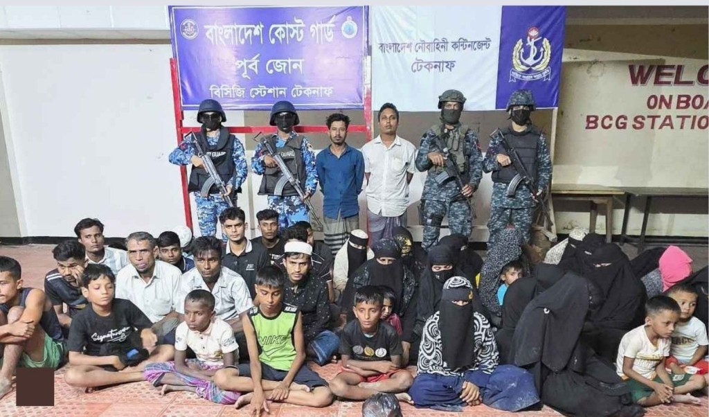 টেকনাফের পাহাড় থেকে নারী-শিশুসহ ৩৮ জন উদ্ধার, ২ পাচারকারী আটক 3 টেকনাফের পাহাড় থেকে নারী শিশুসহ ৩৮ জন উদ্ধার ২ পাচারকারী আটক 1759486409 টেকনাফের পাহাড় থেকে নারী-শিশুসহ ৩৮ জন উদ্ধার, ২ পাচারকারী আটক