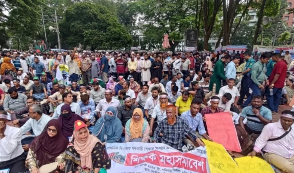 প্রাথমিক সহকারী শিক্ষকদের অনশন কর্মসূচি নিয়ে যা জানা গেলো 3 প্রাথমিক সহকারী শিক্ষকদের অনশন কর্মসূচি নিয়ে যা জানা গেলো 1760688413 প্রাথমিক সহকারী শিক্ষকদের অনশন কর্মসূচি নিয়ে যা জানা গেলো