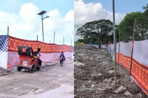 সড়ক দিয়ে গেলেন উপদেষ্টা, পর্দা টানিয়ে আবর্জনার স্তূপ আড়াল